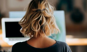 Woman Facing Laptop